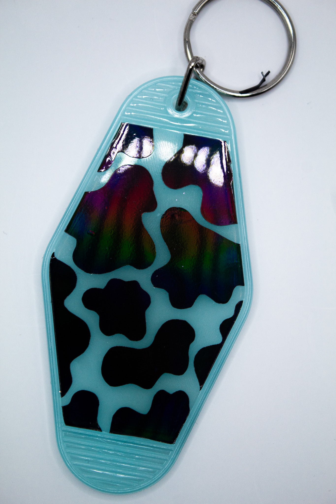 Cow Print Motel Keychain