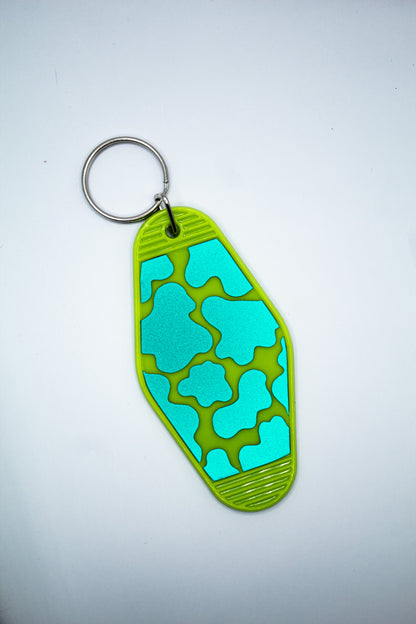 Cow Print Motel Keychain