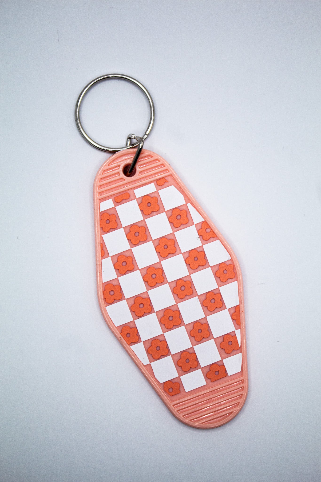 Checkerboard and Flowers Motel Keychain