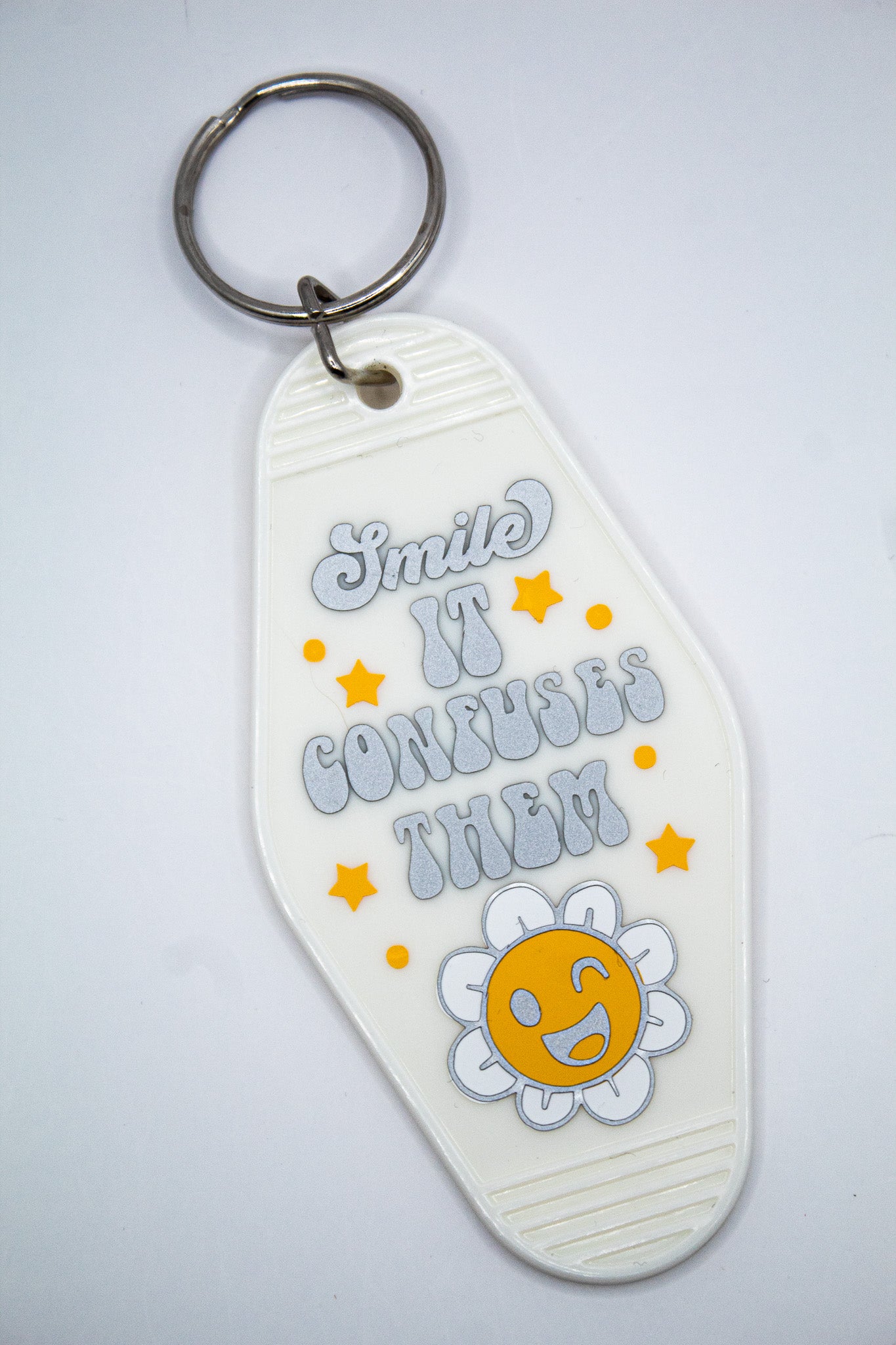 Smile It Confuses Them Motel Keychain