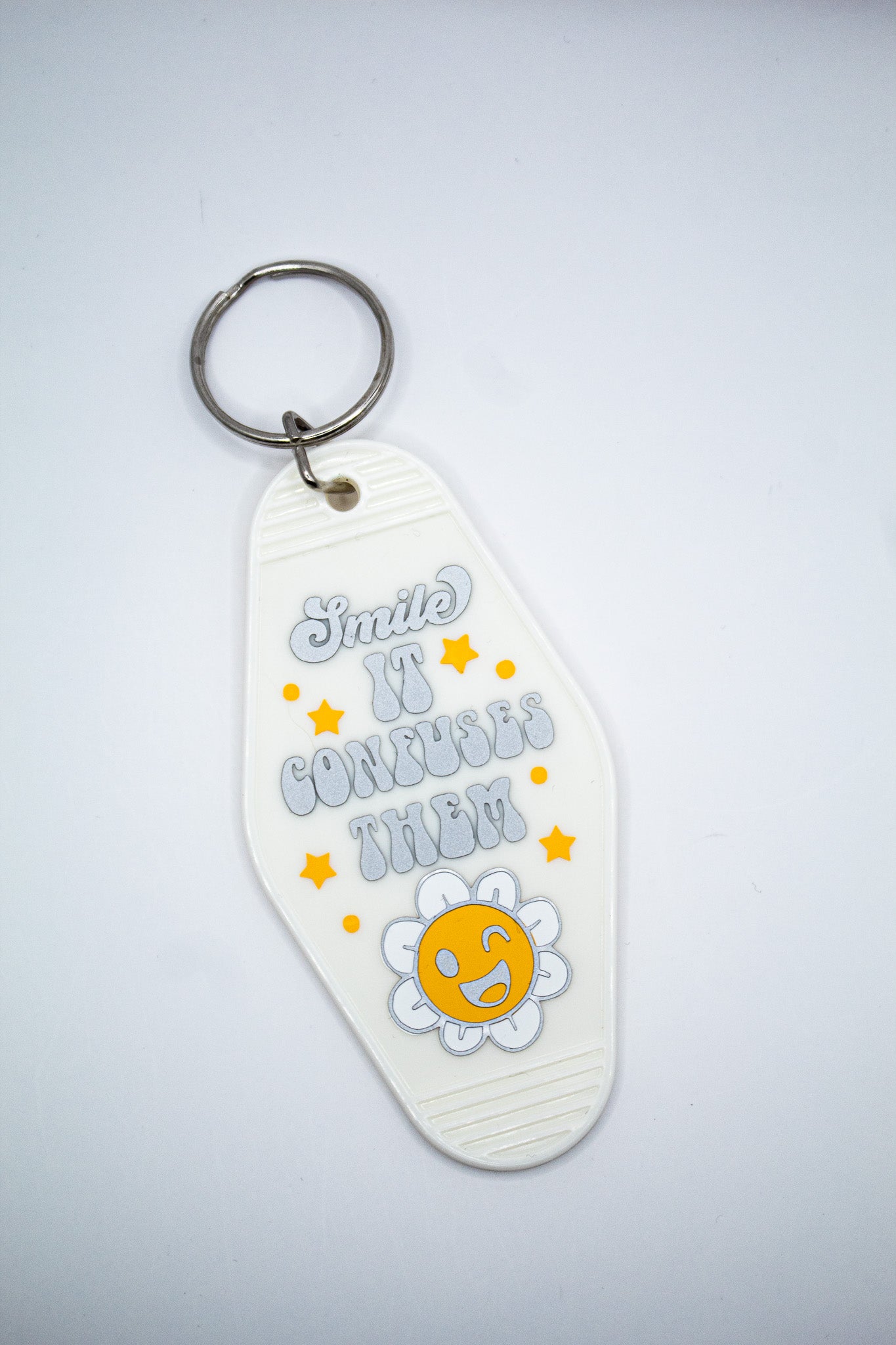 Smile It Confuses Them Motel Keychain